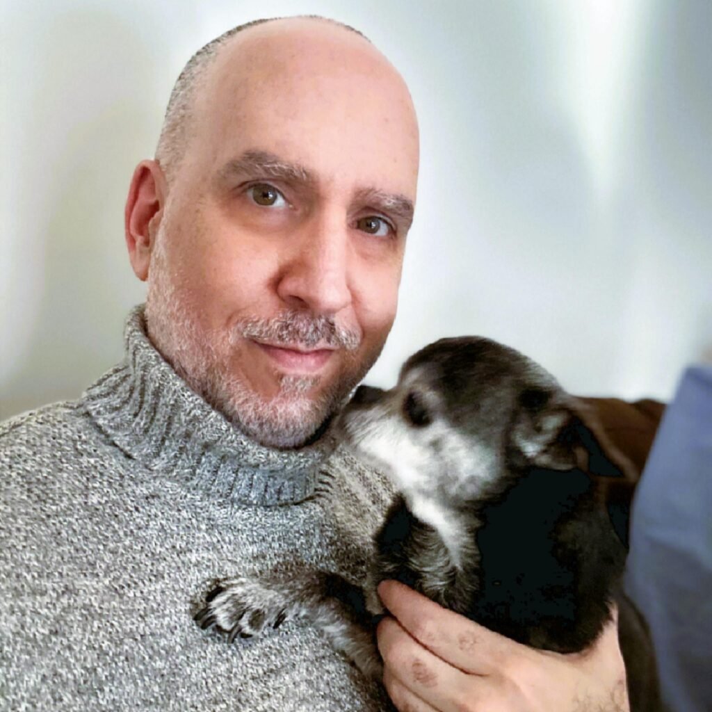 Jeffrey Silverstone holding a dog